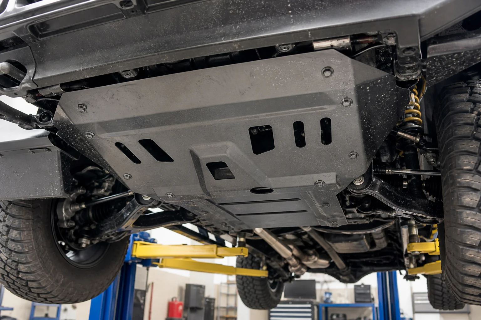 Underbody skid plate and engine protection panel on off-road truck, 1200x800